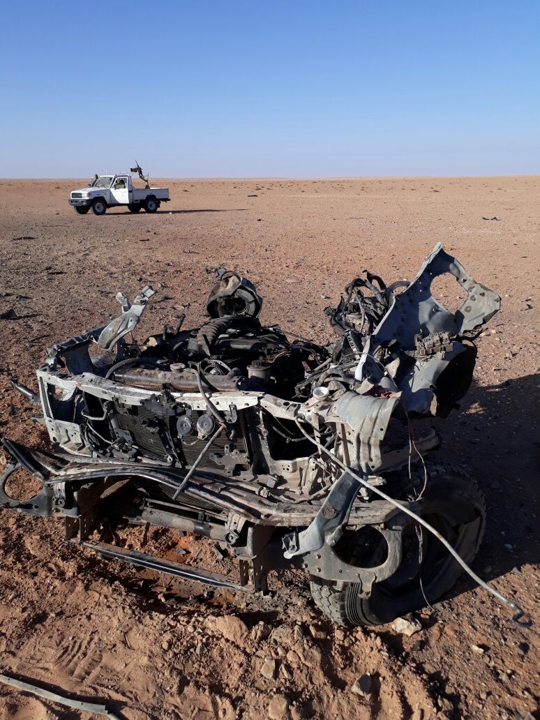 The remains of an ISIS vehicle after an attack on At Tanf deconfliction zone
