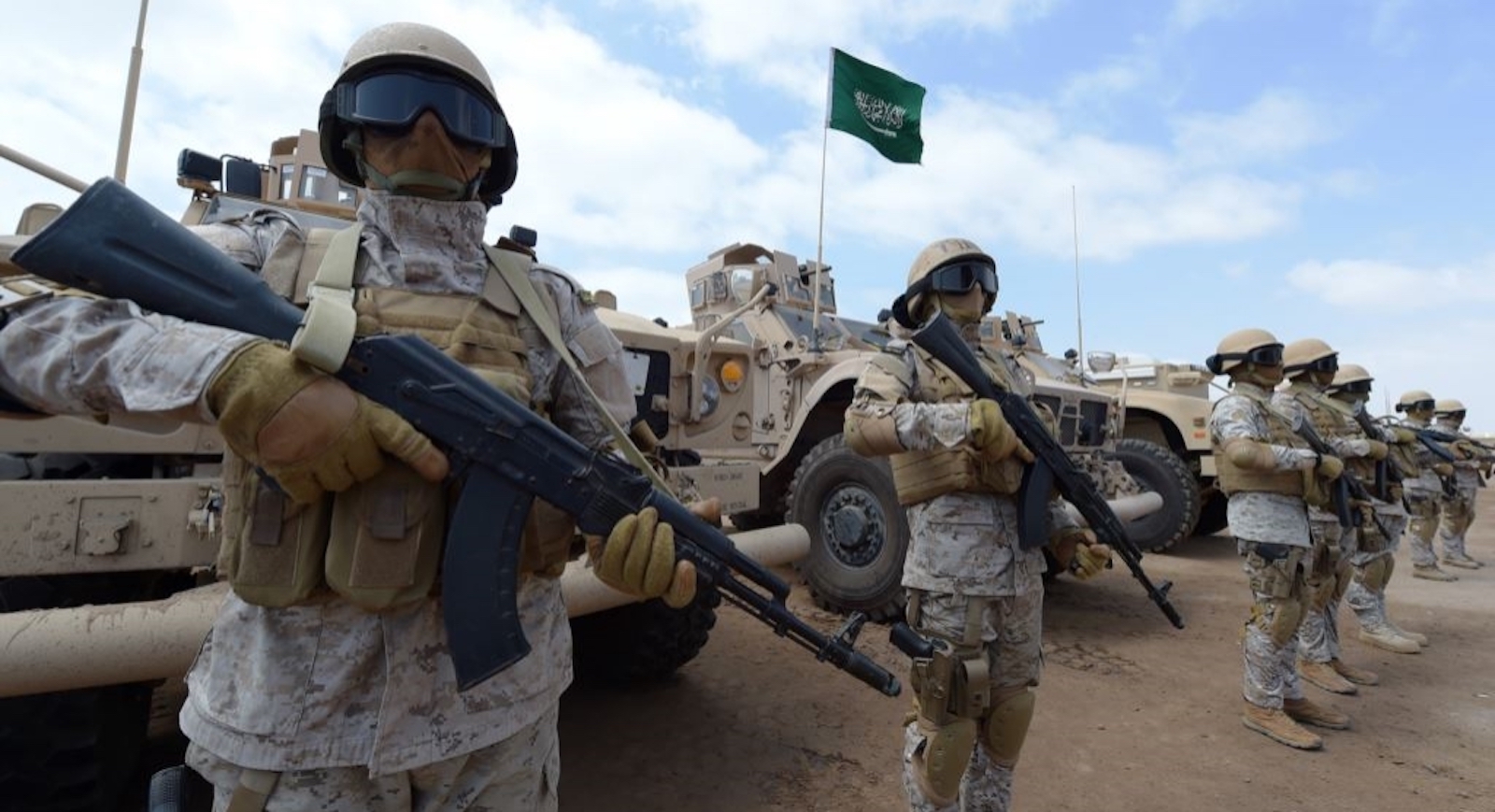 Saudi forces take part in military exercises during a visit by Yemeni Prime Minister Khaled Bahah at the Saudi-led coalition military base in Yemen's southern embattled city of Aden.