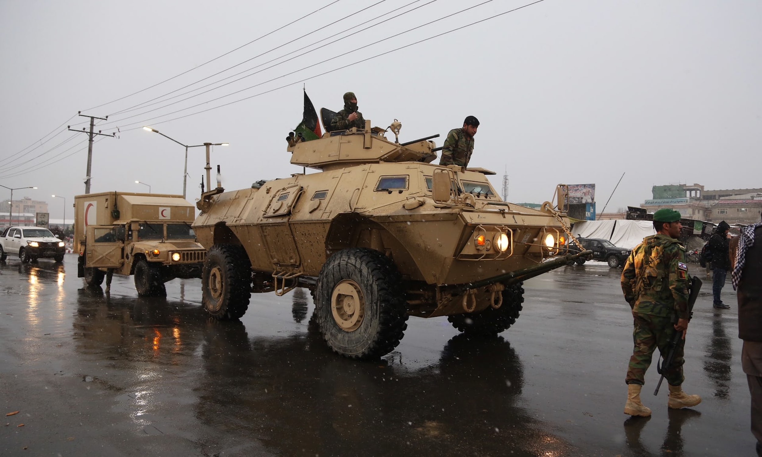 Afghan security personnel outside the Marshal Fahim academy in Kabul