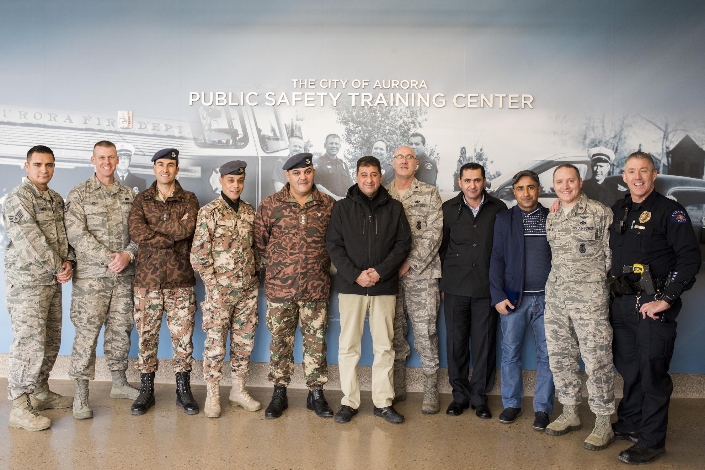 Members of the Royal Jordanian Air Force Ground Defense, Jordanian Military Security, Aurora Police Department, the Colorado Air National Guard's 233d and 140th Security Forces Squadrons collaborate on tactics and procedures for base defense