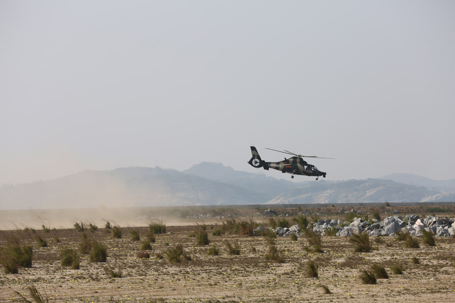 Chinese People's Liberation Army attack helicopter takes part in an exercise