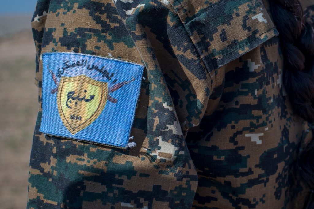 Local female Manbij Military Council trainees learn marksmanship training