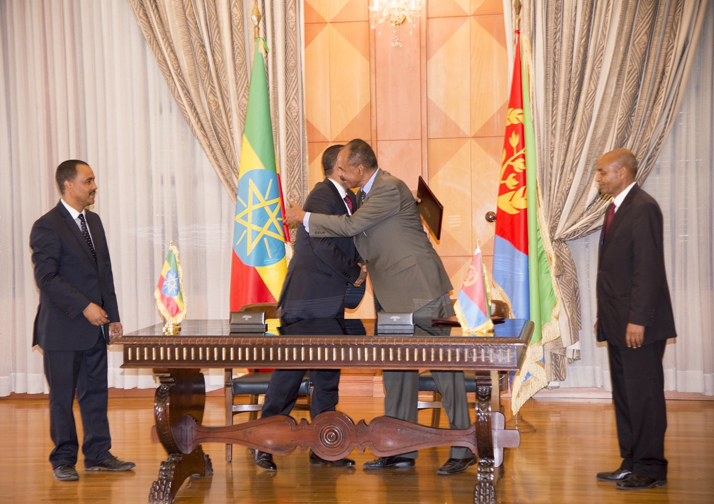 Ethiopian Prime Minister Abiy Ahmed (left) and Eritrean President Isaias Afwerki (right) hug after signing a Joint Declaration of Peace and Friendship at the state house in Asmara, Eritrea