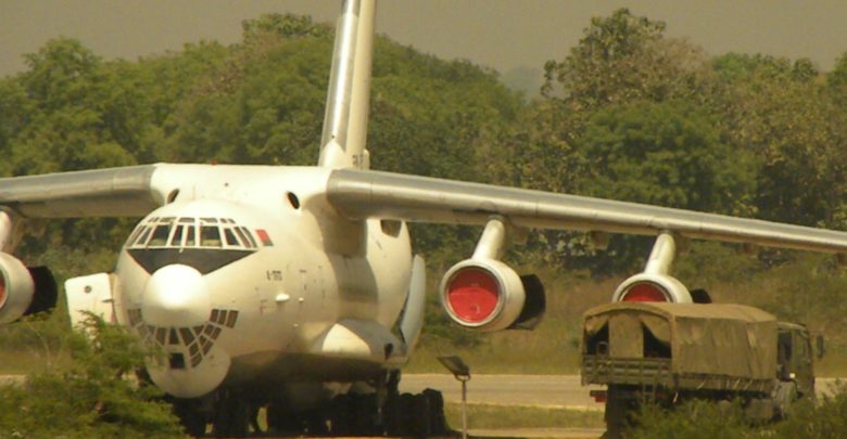 Ilyushin-76 aircraft off-loading ammunition crates in Juba