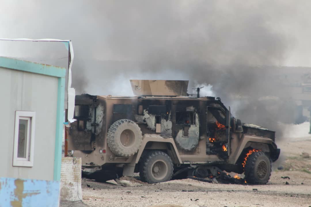 Aftermath of a vehicle bomb at an SDF checkpoint in Shaddadi in Syria's Hasakah governorate