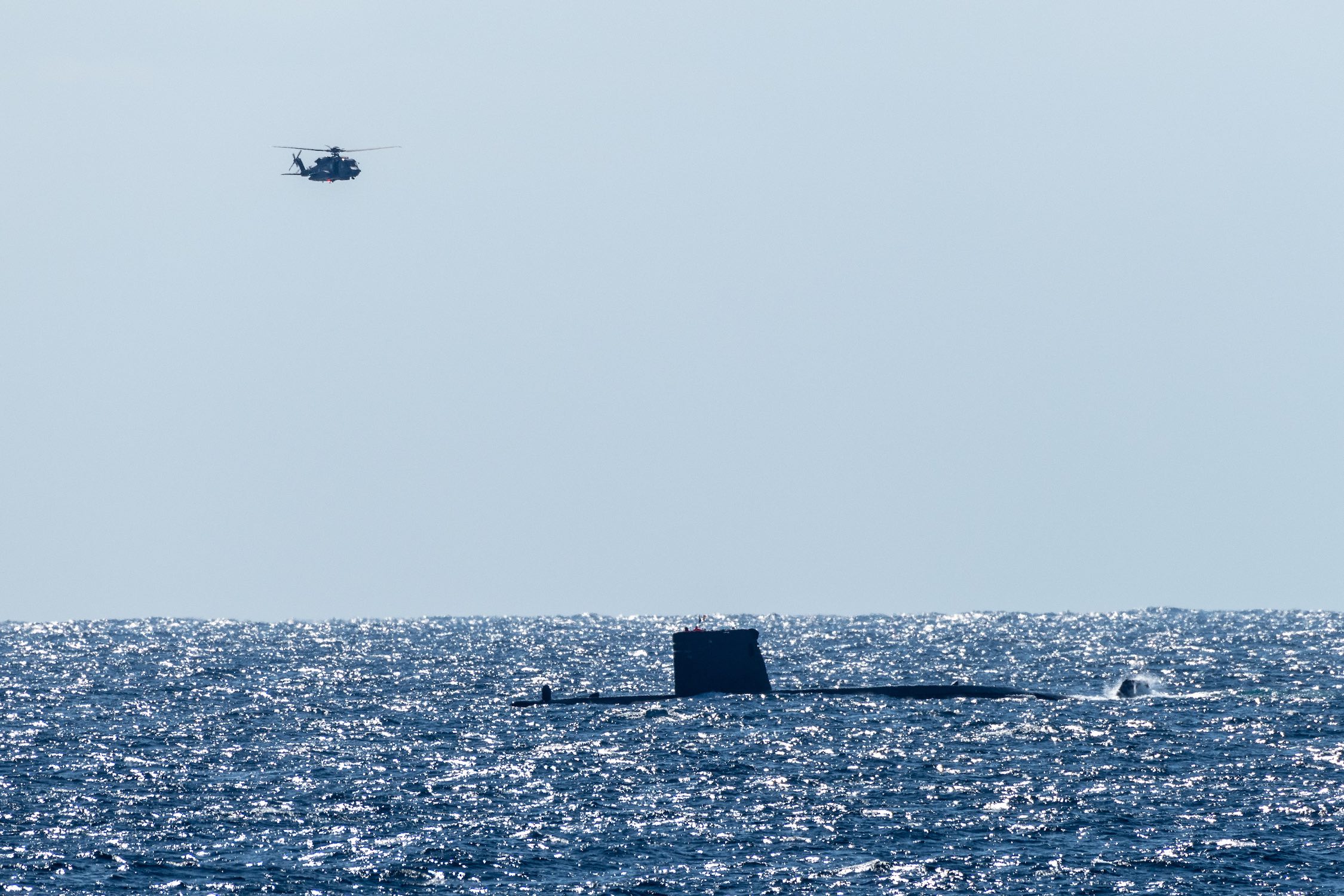 IONIAN SEA, Feb 25, 2018. HMCS Toronto helicopter flies over ESPS Tramonrana in Dynamic Manta 2019