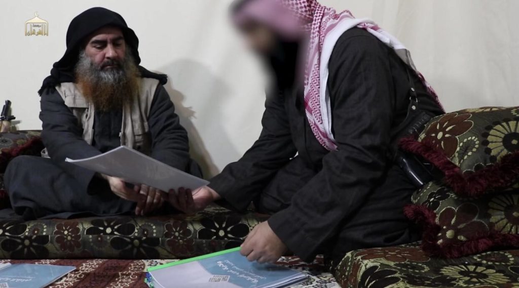 Baghdadi reads reports on ISIS provinces