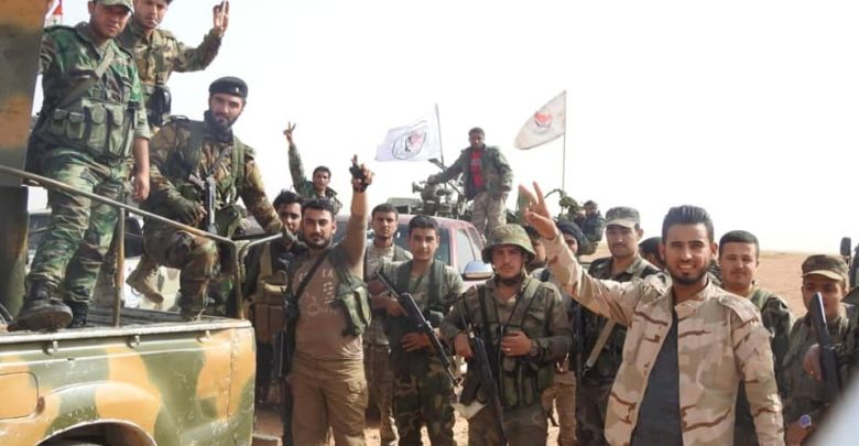Syrian National Defense Forces militia members during a joint operation with Iraqi Popular Mobilization Units