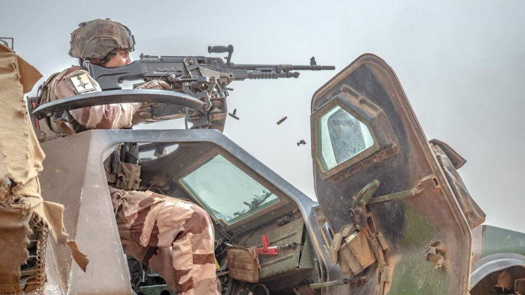 French soldier fires during Operation Aconit