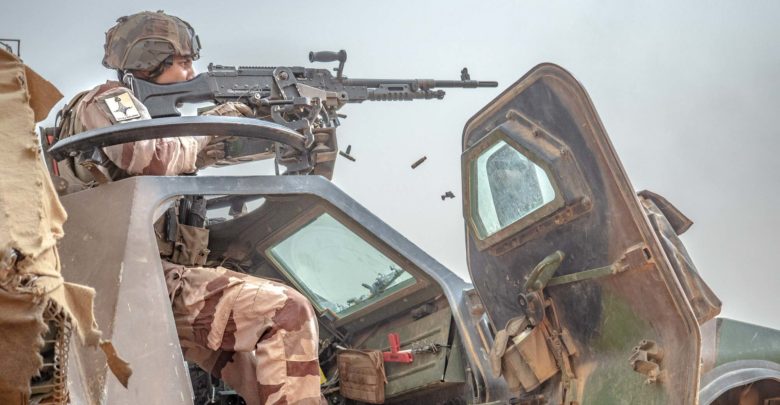 French soldier fires during Operation Aconit