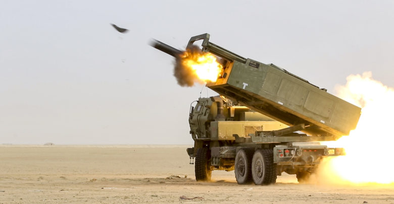 US Army soldiers fire a High Mobility Artillery Rocket System (HIMARS) during a joint live-fire exercise.