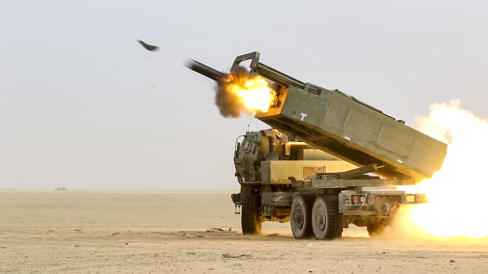 US Army soldiers fire a High Mobility Artillery Rocket System (HIMARS) during a joint live-fire exercise.