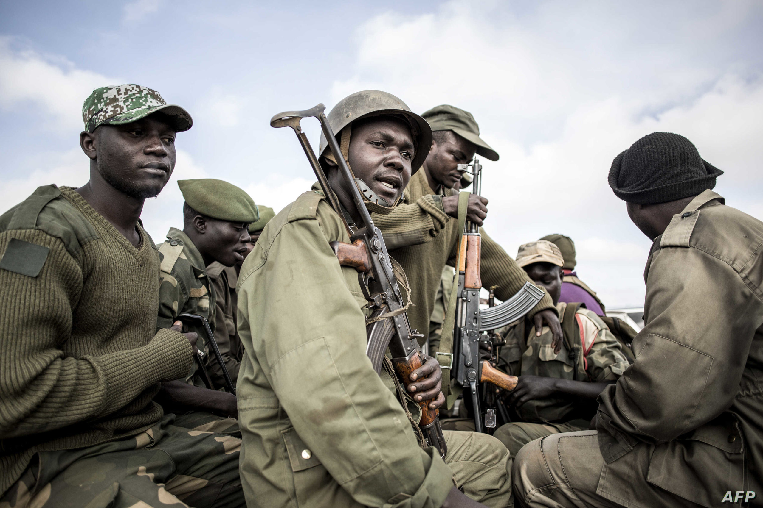 Soldiers of the Armed Forces of the Democratic Republic of the Congo (FARDC) prepare to escort health workers attached to ebola response programs on May 18, 2019 in Butembo, north of Kivu