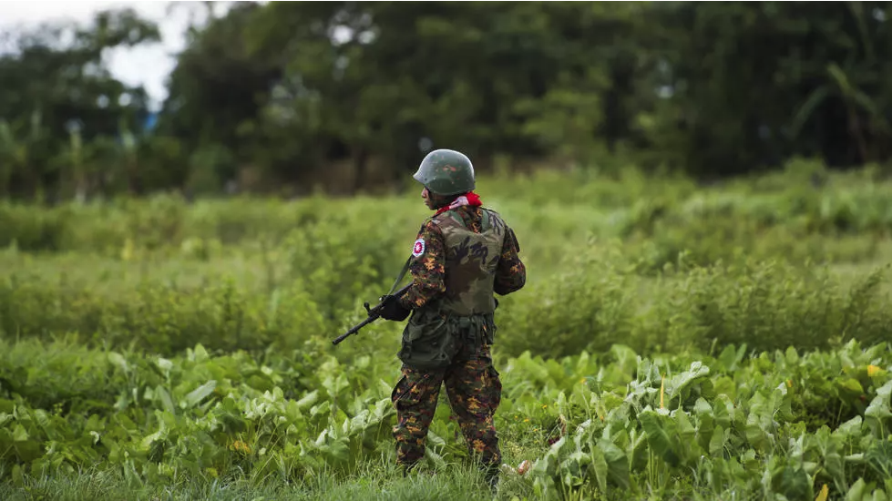 A Myanmar soldier guards an area at the Sittwe airport as British foreign minister Jeremy Hunt arrives in Sittwe, Rakhine state, on September 20, 2018