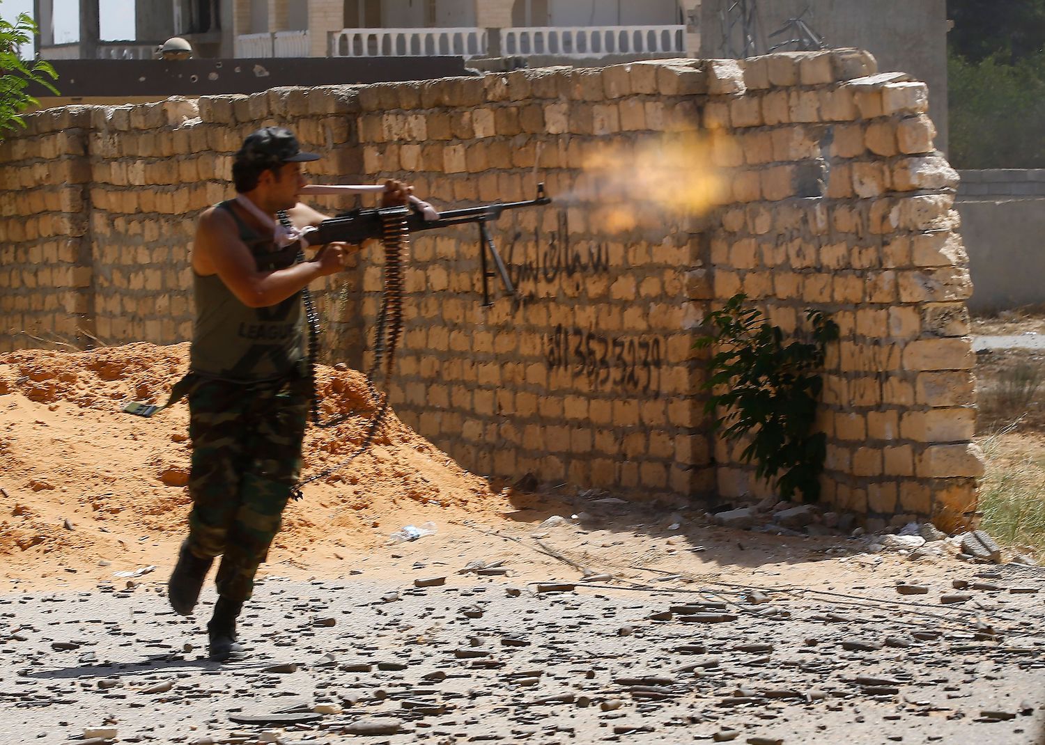 A fighter loyal to the UN-recognized Libyan Government of National Accord (GNA) clashes with forces loyal to strongman Khalifa Haftar in the suburb of Ain Zara in Tripoli on September 7, 2019.