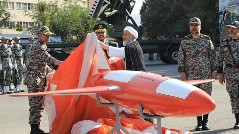 Brigadier-General Alireza Sabahifard, center, unveils the 