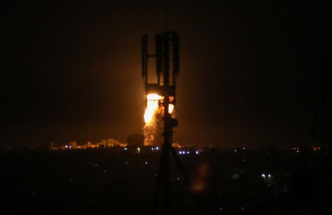 A ball of fire is seen following an Israeli airstrike on Rafah in the southern Gaza Strip early on August 3, 2020.