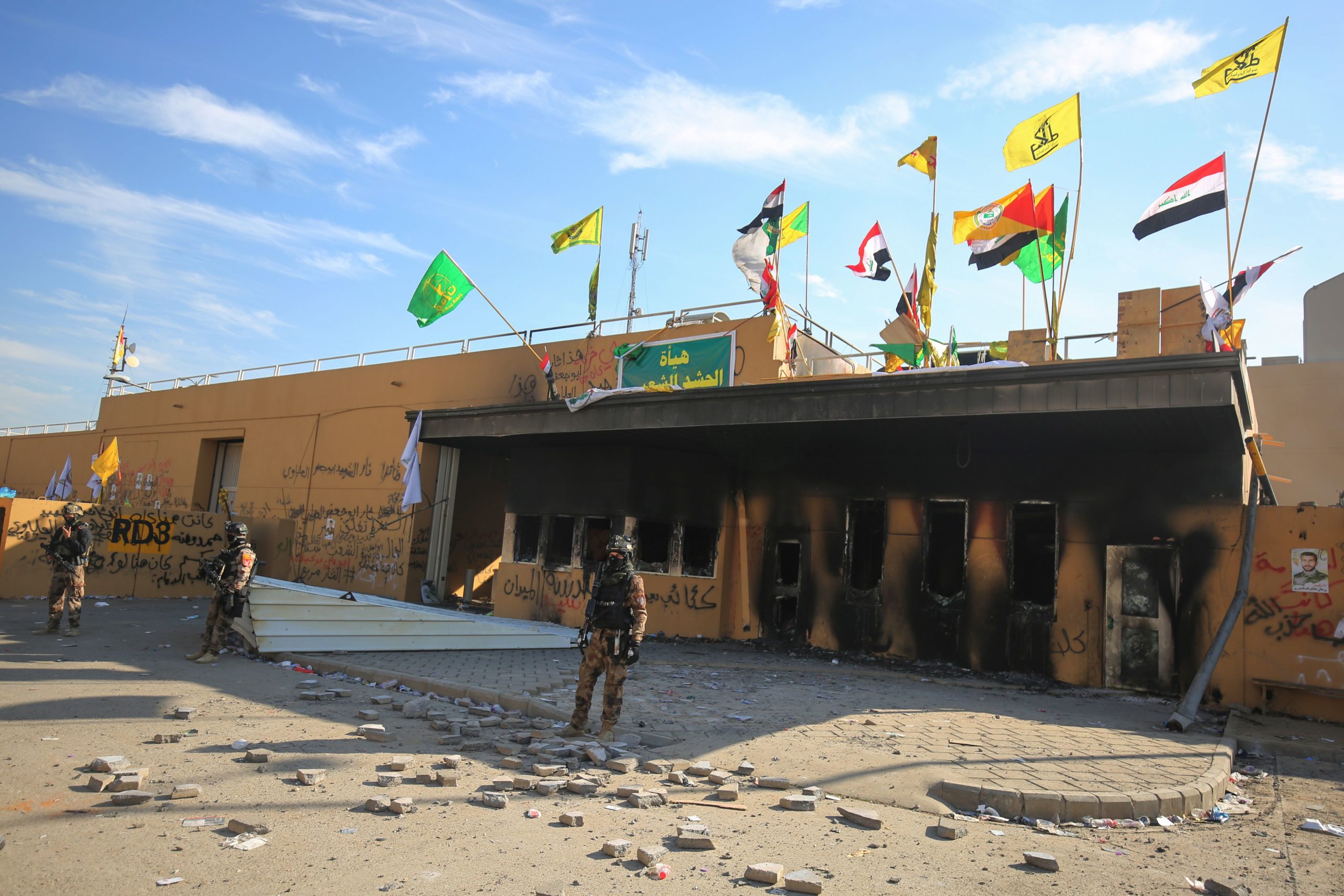 Iraqi security forces stand guard in front of the US embassy in Baghdad, on January 1, 2020. Thousands of pro-Iran demonstrators had vandalized the compound after US air strikes killed 25 of their fighters. Photo: Ahmad al-Rubaye/AFP.