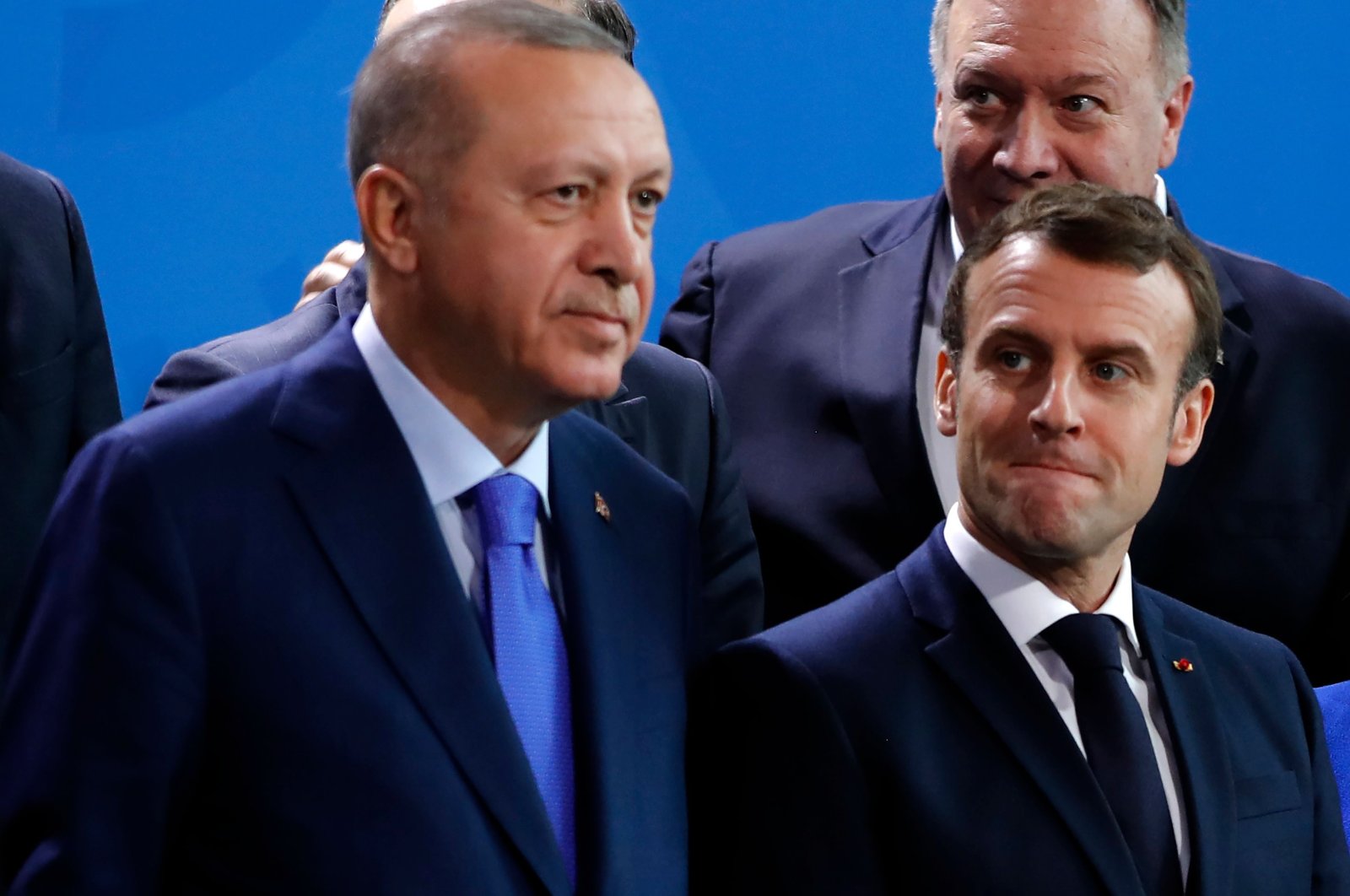 Turkish President Recep Tayyip Erdogan and French President Emmanuel Macron during a peace summit on Libya at the Chancellery in Berlin. 