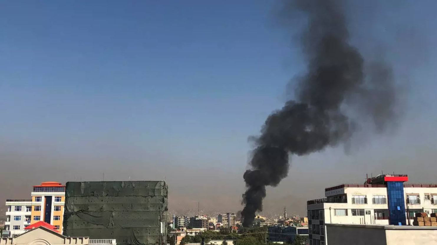 A smoke plume rises following an explosion targeting the convoy of Afghanistan's vice president Amrullah Saleh in Kabul