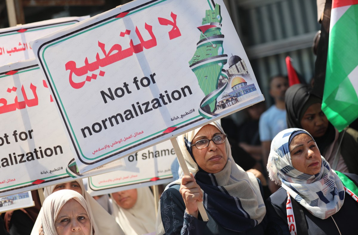Palestinians gather to protest a deal between the United Arab Emirates (UAE) and Israel to normalize ties in Gaza City, Gaza on August 19, 2020