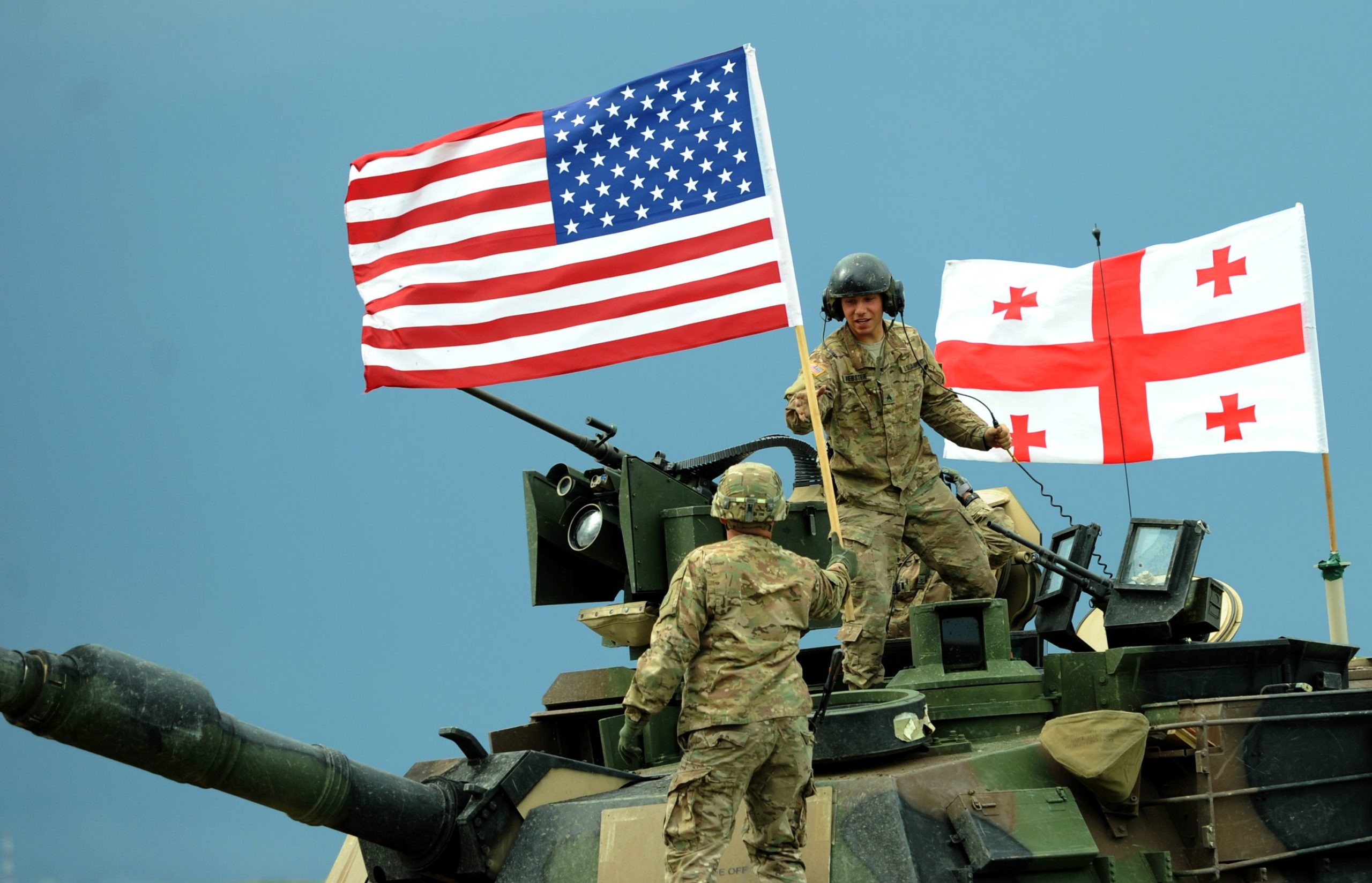 US servicemen stand atop a M1A2 Abrams tank during the Noble Partner 2016 joint military exercise at the Vaziani training area outside Tbilisi on May 24, 2016