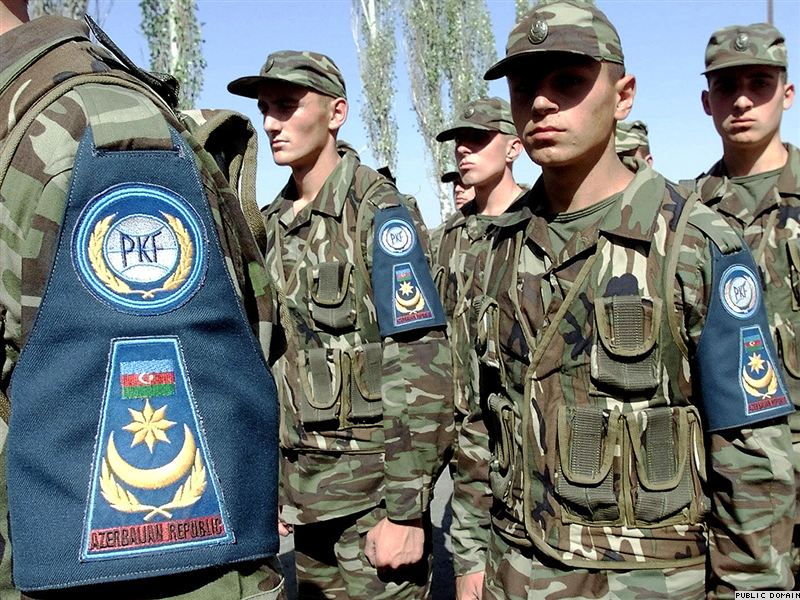 Members of the Azerbaijan Army pass in review during CENTRASBAT (Central Asian Peacekeeping Battalion) 2000 opening ceremonies on September 13th, 2000.