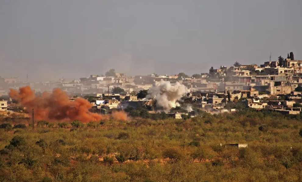 Smoke plumes rise from buildings in the village of Kansafra, in the southern countryside of Syria's rebel-held northwestern Idlib province, on October 23, 2020.