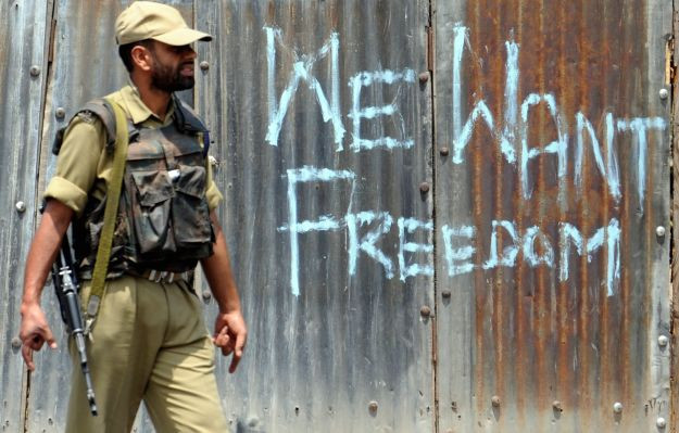 An Indian paramalitary policeman on patrol.
