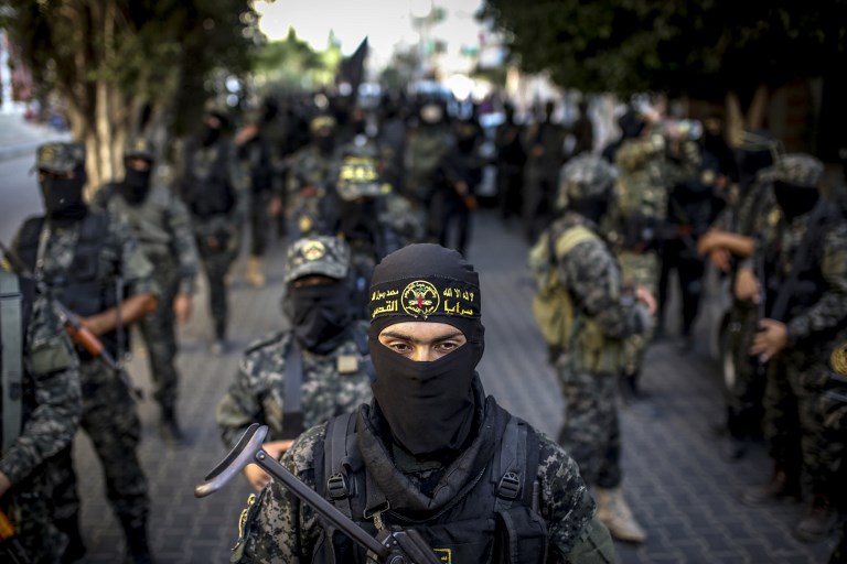 Members of the Palestinian Islamic Jihad movement march during a military parade in Gaza City on October 4, 2018