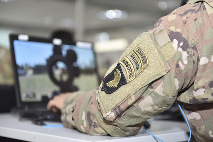 A US Army Sapper, Ranger, and Airborne qualified Soldier assigned to the 101st Airborne Division, uses the Virtual Battle Space 3 (VBS3) system at the Joint Multinational Simulation Center’s Tactical Gaming division in Camp Aachen, Germany, May 3, 2019.