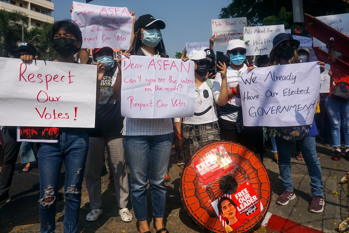 Protesters take part in a demonstration against the military coup in front of the Indonesian embassy in Yangon