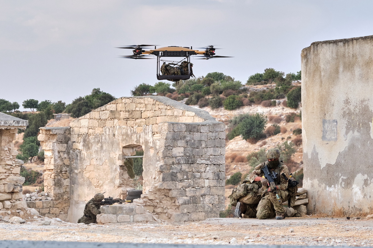 Royal Marines successfully receiving bergan drops from Malloy Aeronautics heavy lift drone