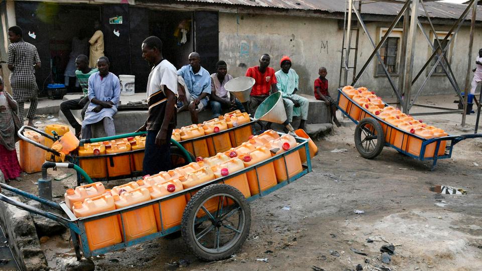 Water sellers are seen in Maiduguri, Nigeria on February 1, 2021