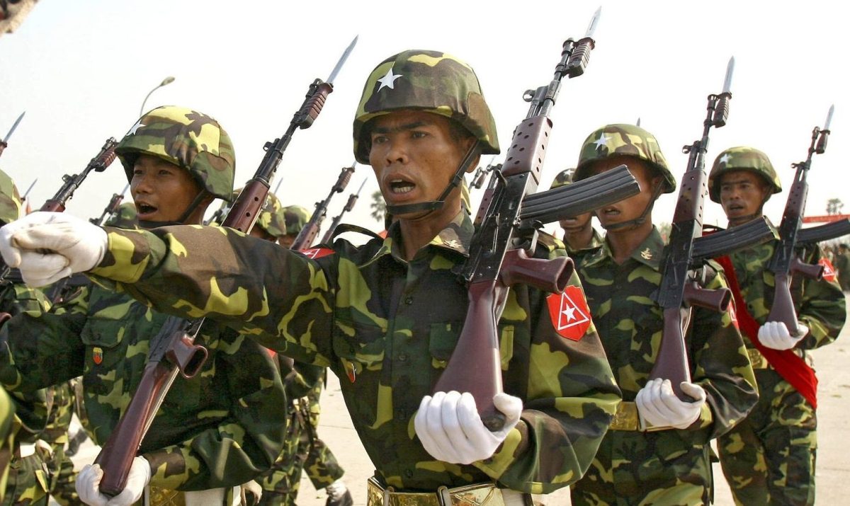 Myanmar soldiers seen marching in formation.