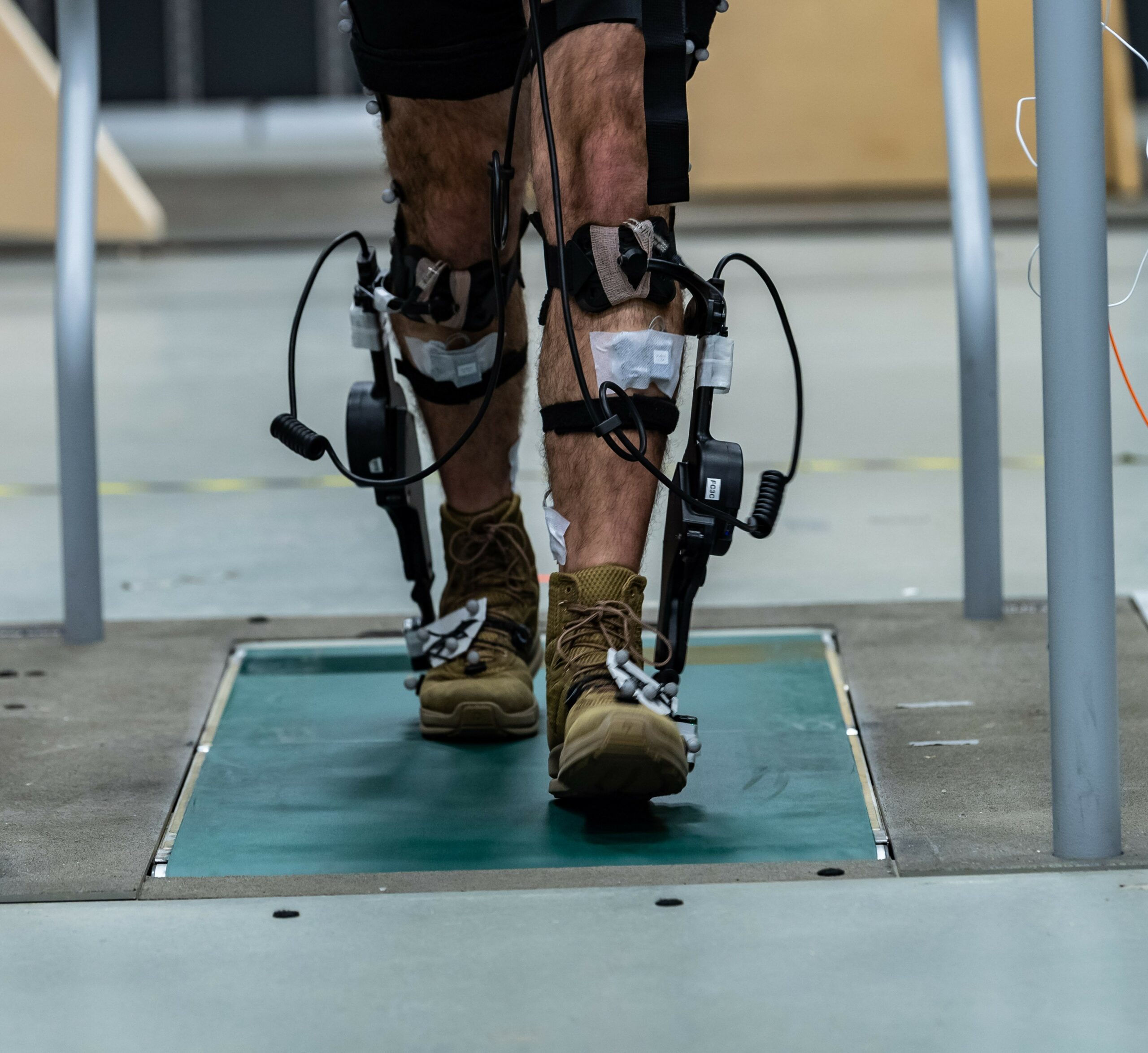 autonomous tech attached to the feet and legs of test subject