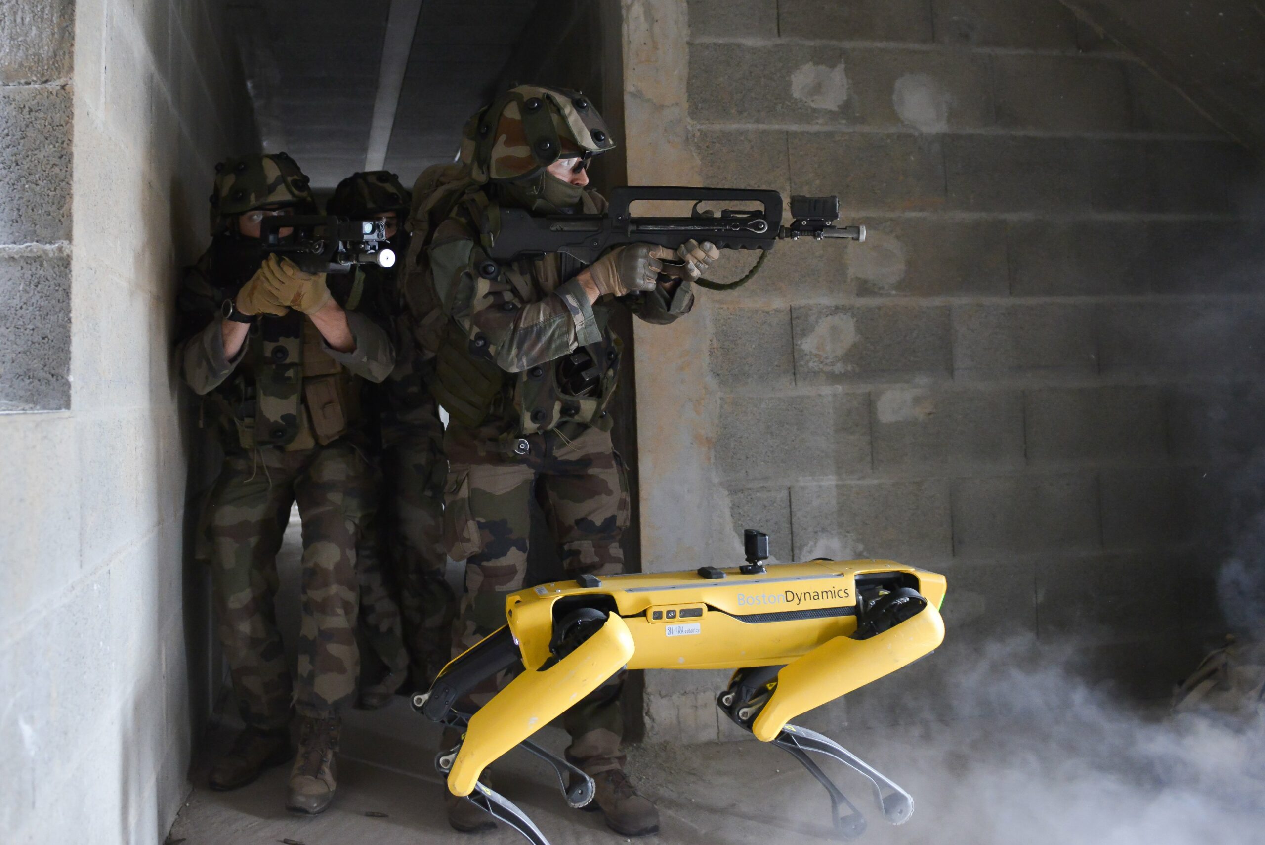 The Boston Dynamics robot, nicknamed Spot, seen alongside a French soldier