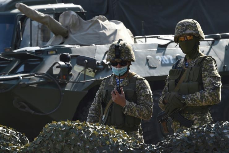 Kyrgyzstan soldiers at a checkpoint on the outskirts of Bishkek