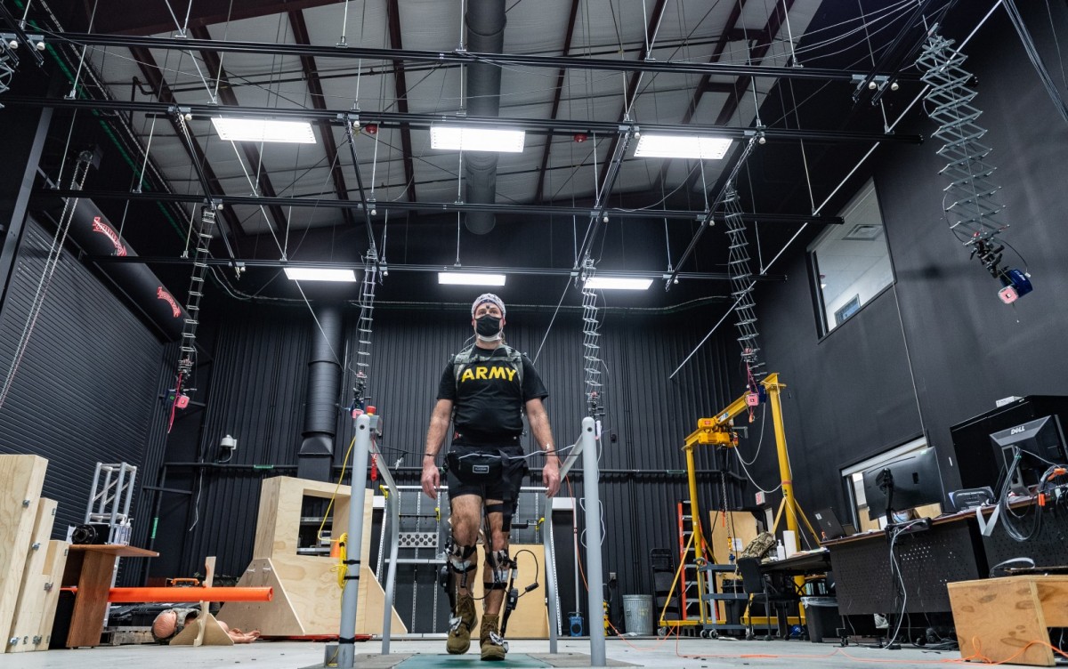 1- Sgt. Maj. Luke Blum, who serves as the DEVCOM acting command sergeant major and the senior enlisted leader for ARL, dons the ExoBoot as part of a study that analyzes how humans and autonomous systems adapt to each other