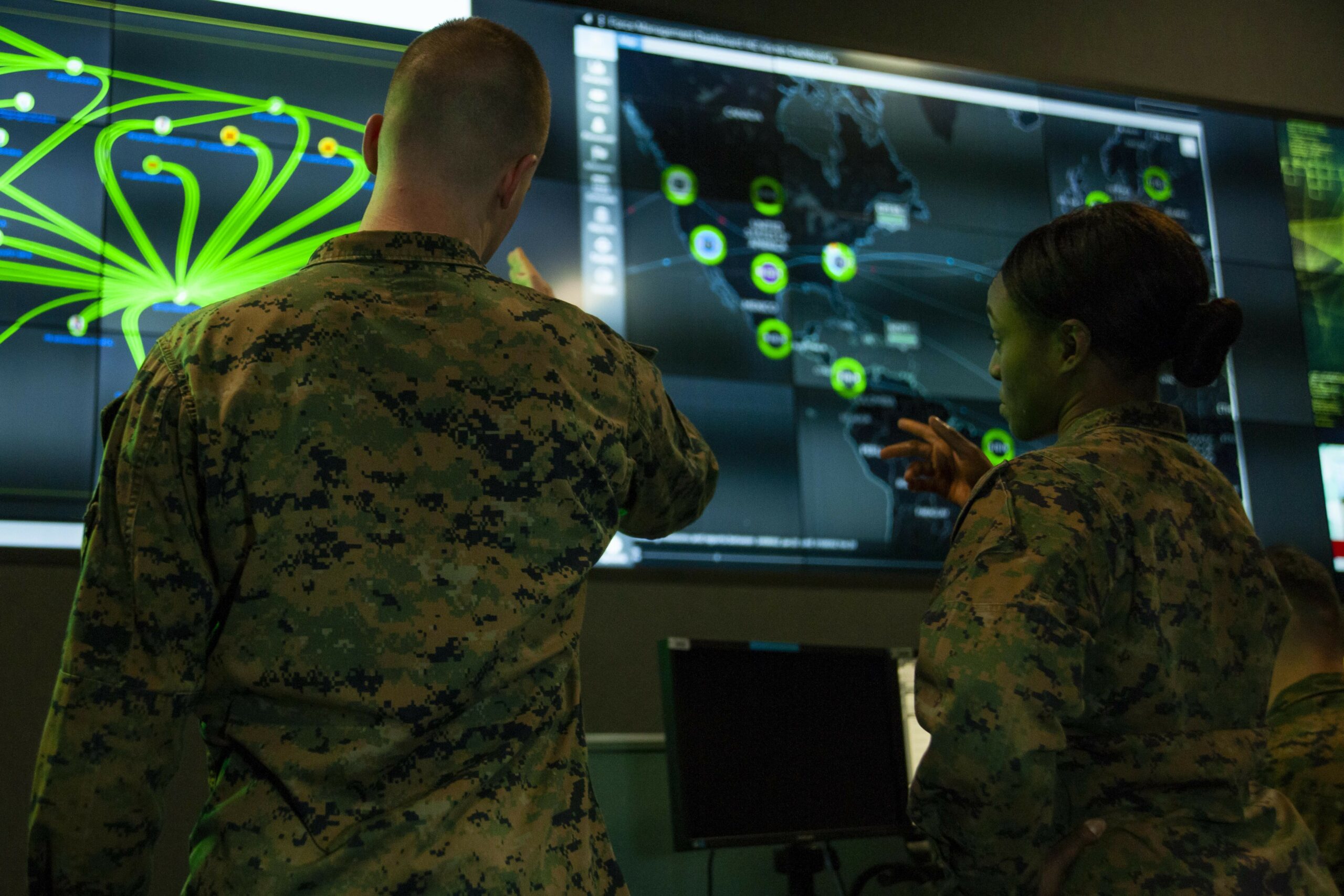 Marines with Marine Corps Forces Cyberspace Command at the cyber operations center at Lasswell Hall aboard Fort Meade, Maryland, 2020.