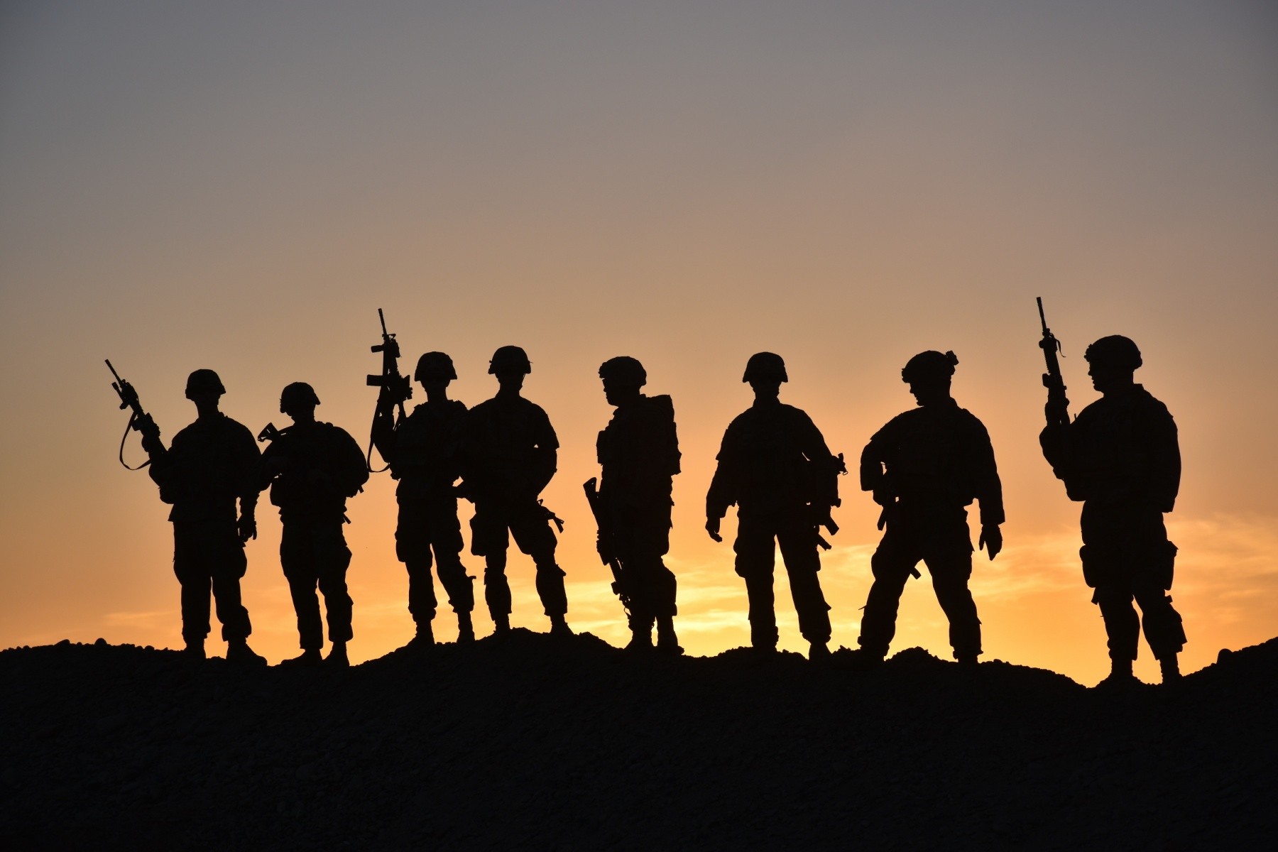 Soldiers from Task Force Stalwart, which is compromised of Soldiers from 1st Battalion, 41st Infantry Regiment, 2nd Brigade Combat Team, 4th Infantry Division, pose for a group photo, March 28, 2018, in a post in the outskirts of Afghanistan.