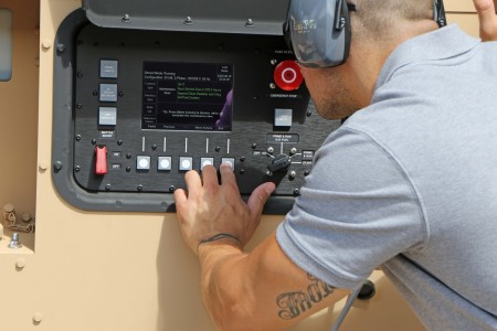 C5ISR Center engineers work on a hybrid power system as part of the US Army’s ongoing research in tactical microgrids, which provide resilient and efficient power for soldiers in the field. 