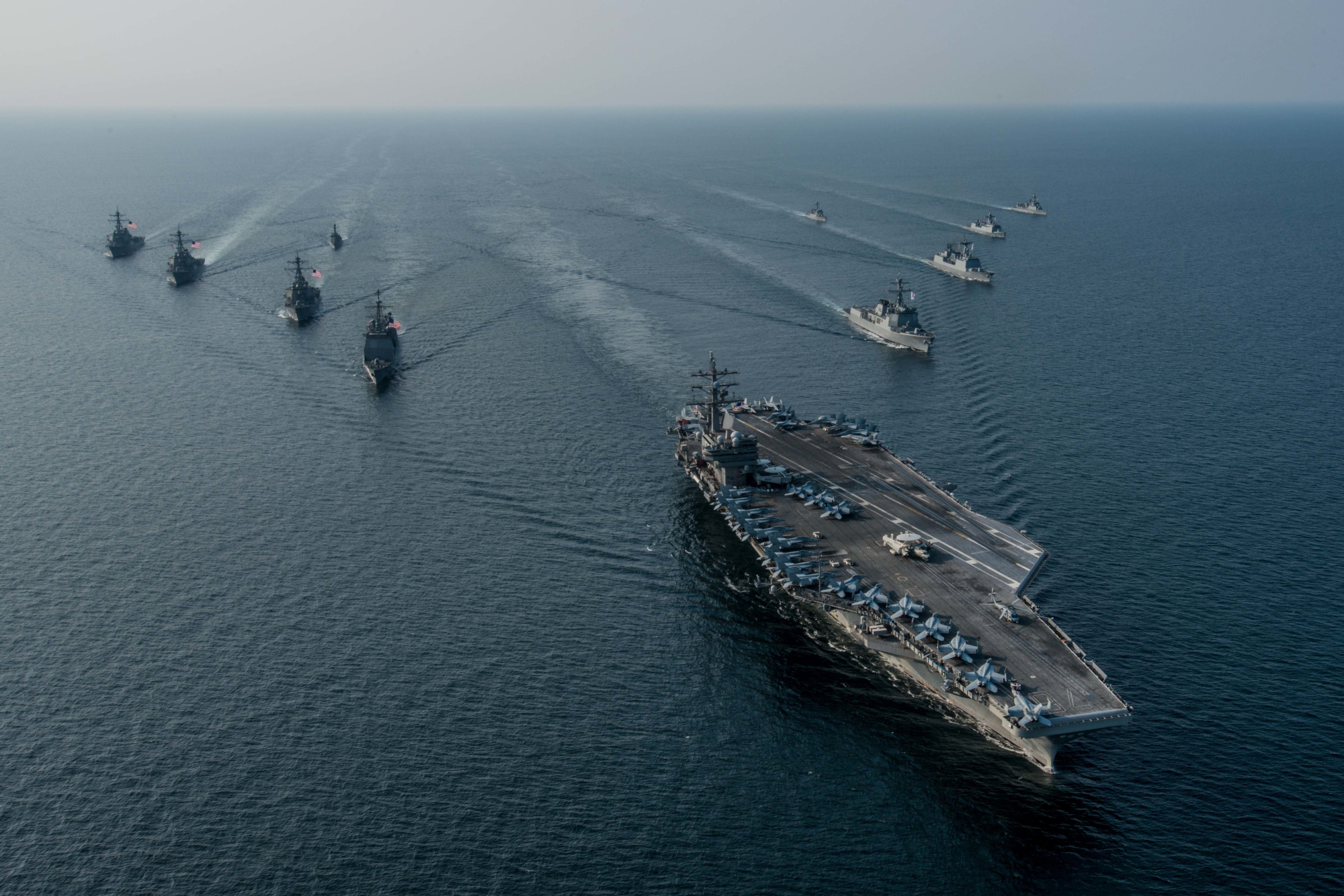 The US Navy’s only forward-deployed aircraft carrier, USS Ronald Reagan (CVN 76), steams in formation with ships from Carrier Strike Group Five (CSG 5) and the Republic of Korea Navy (ROKN) during Exercise Invincible Spirit.