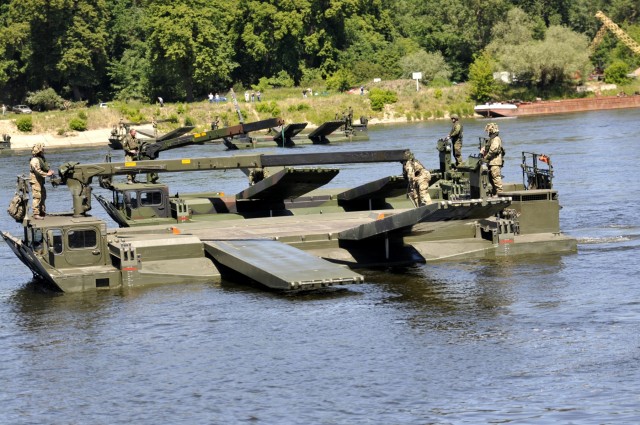 Amphibious bridging vehicles