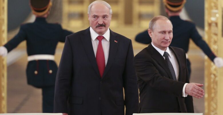 Russia's President Vladimir Putin and his Belarus' counterpart Alexander Lukashenko walk in as they attend a session of the Supreme State Council of the Union State at the Kremlin in Moscow on March 3, 2015.