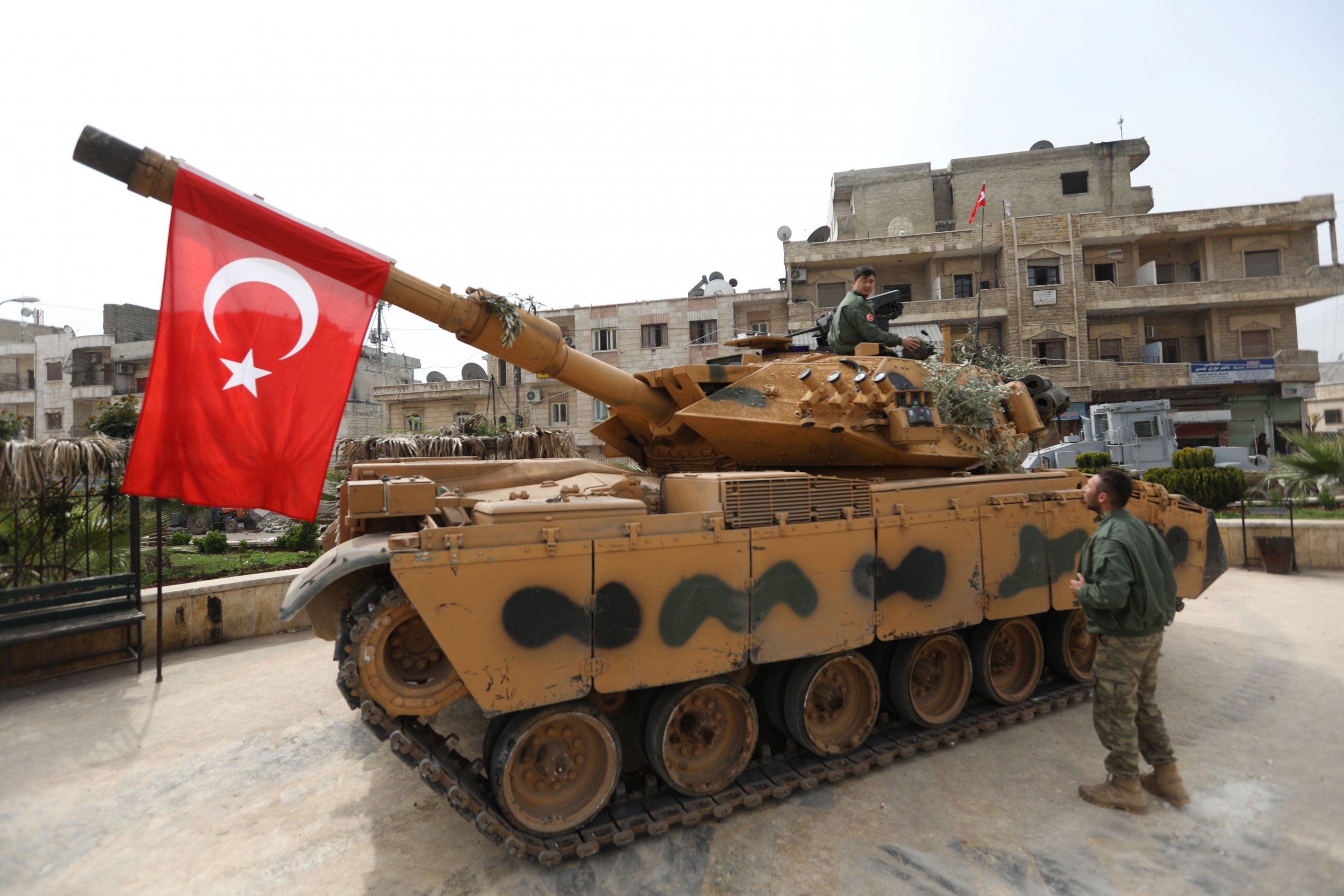 A tank belonging to Turkish soldiers and rebel Free Syrian Army fighters is seen in the Kurdish-majority city of Afrin, in northwestern Syria, after they took control of the city from the Kurdish People’s Protection Units (YPG), on March 18, 2018
