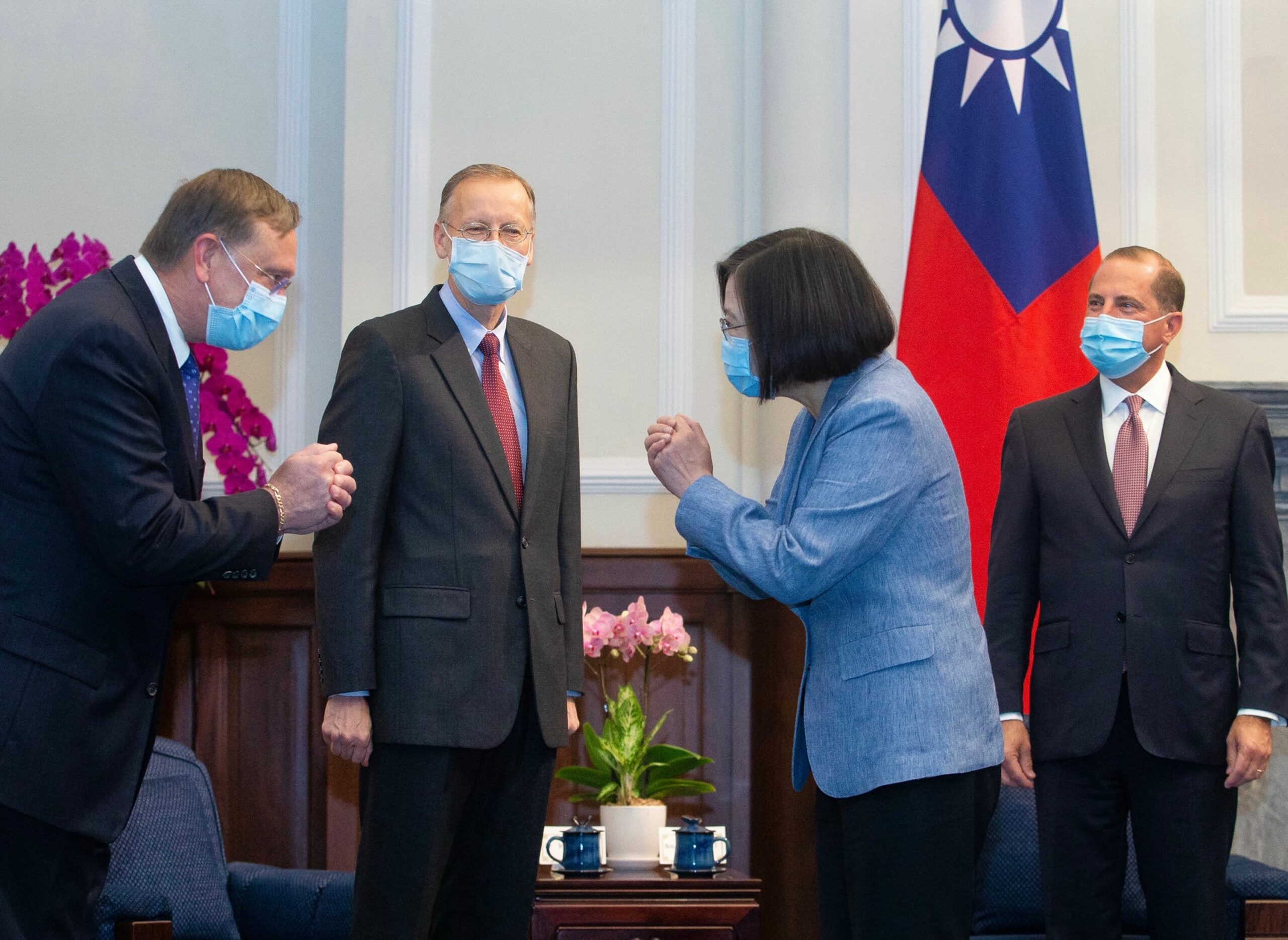 Taiwan’s President Tsai Ing-wen gestures to a US official as US Secretary of Health and Human Services Alex Azar