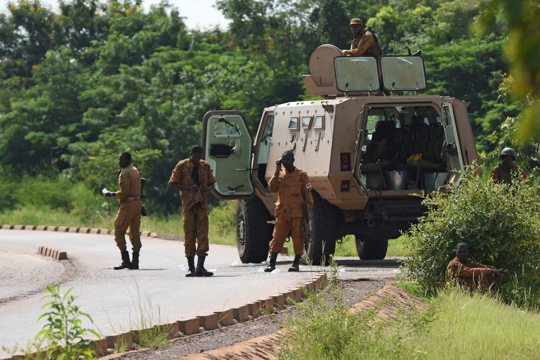 Soldiers patrol a town in Burkina Faso