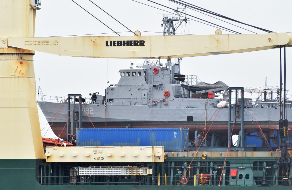 Former US Coast Guard patrol boats refitted for the Ukrainian navy are seen on board the cargo ship Ocean Grand arriving at the Black Sea port of Odessa, Ukraine