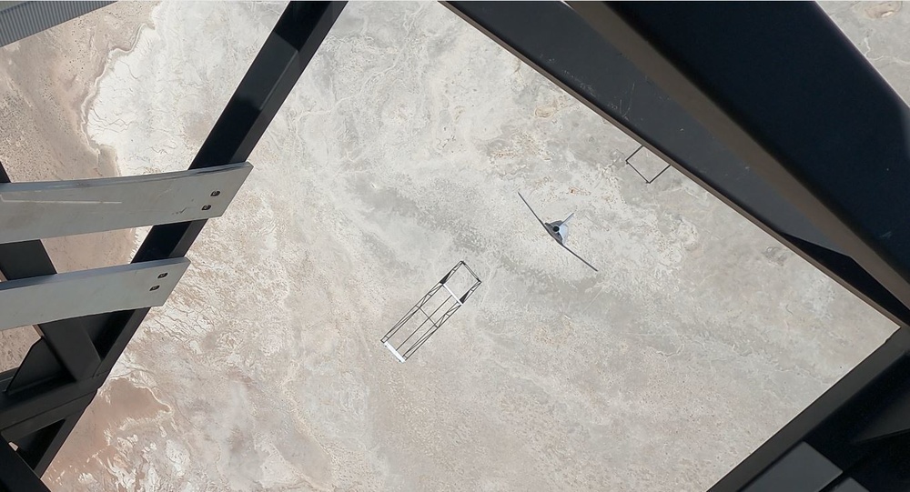 Once the Palletized Munition Deployment System was stabilized under the parachutes, the production long range cruise missile STV and mass simulants were released sequentially, timed for safe separation between munitions. 